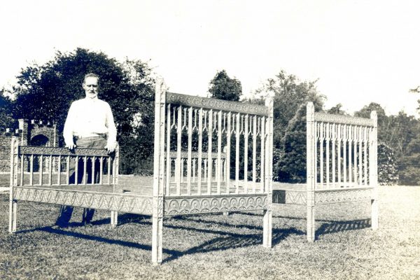 Charles Woodsend carving twin beds